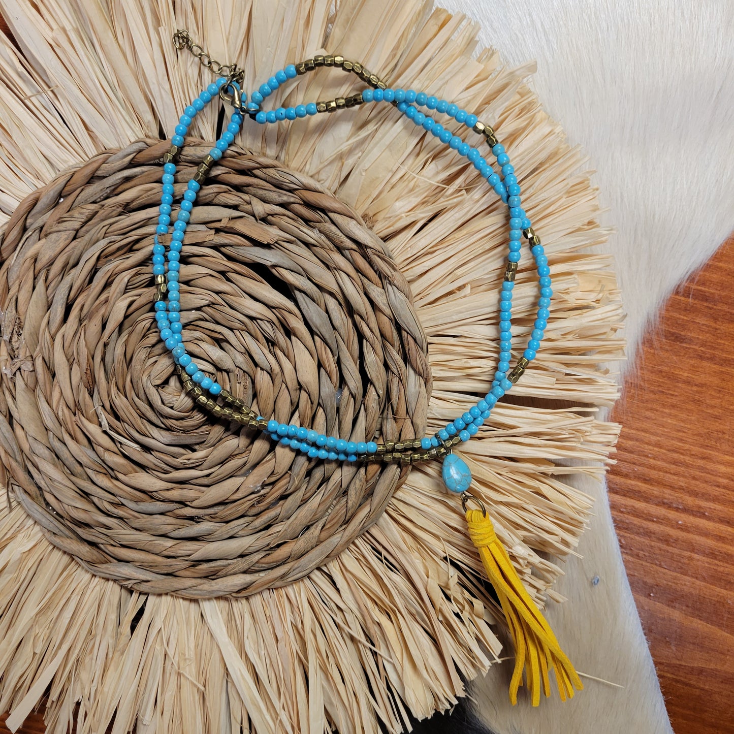 YELLOW TAIL NECKLACE